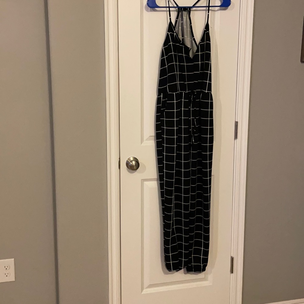 Black jumpsuit with white detail